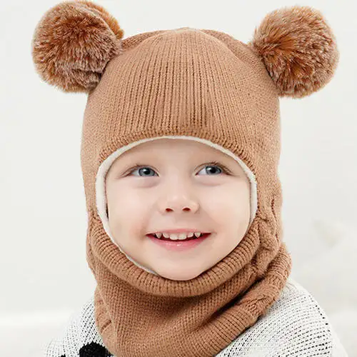 Children's hats and scarves are integrated with velvet padded earmuffs and winter baby warm knitted wool hats for men and women.