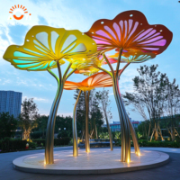 Sculpture géante personnalisée en métal en forme de feuille de lotus, lumineuse et durable, pour l'aménagement paysager extérieur de Noël, idéale pour les places municipales et les sites touristiques.