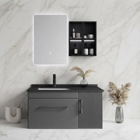 Meuble-lavabo de salle de bain moderne noir mat flottant à cannelures avec miroir rétroéclairé par LED, armoire latérale et porte cannelée, lavabo intégré