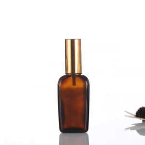 2022 New Multiple Caps Available <b>Empty</b> 50ml Square Amber Glass Pump Sprayer Perfume <b>Spray</b> <b>Bottle</b> with Screen Printing Gold Top - Product Image 1