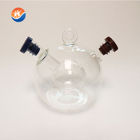 Distributeur d'huile et de vinaigre en verre multifonctionnel de forme carrée au design classique pour cuisine, idéal pour l'huile d'olive, la sauce soja et les assaisonnements.