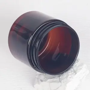 Großhandel Mehrfach-Spezifikation Bernsteinfarbene PET-Flasche mit weitem Maul Kosmetikglas mit schwarzem Deckel Sahrhalteverpackung Verschiedene Kosmetika