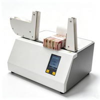 Machine automatique de cerclage de billets de banque avec ruban thermoscellant
