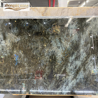 Dalles de quartzite de labradorite émeraude bleue de luxe à couleur naturelle et haute dureté, rétroéclairées pour murs, comptoirs, salles de bain et cuisines