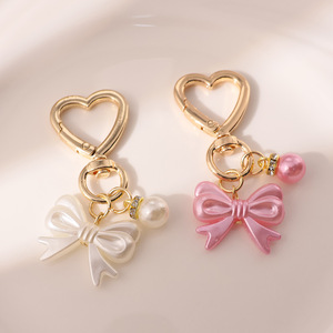 AM Fris en zoet strikje parel gouden deurknop sleutelhanger hanger schattig hoofdtelefoon etui tas hangend ornament - Product Image 5