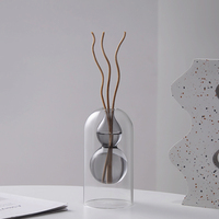 Vente en gros de bouteilles en verre borosilicate avec diffuseur à roseaux bouteille en verre de luxe pour la décoration intérieure avec bâtons de parfum