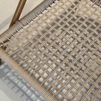 Fauteuil d'extérieur moderne avec dossier tressé et coussins, chaise de jardin pour terrasse et hôtel
