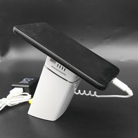 Soporte de Seguridad para Teléfono Móvil al por Mayor con Garras, Soporte Antirrobo para Celular con Abrazadera de Carga para Todos los Teléfonos, Blanco