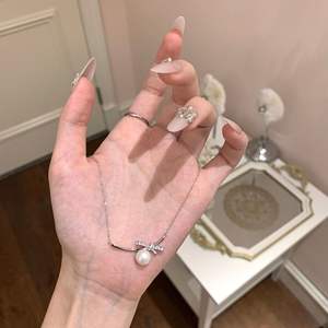 สร้อยคอเงินแท้ S925 ลายดอกคามิลเลีย พร้อมสายคล้องคอแบบดอกไม้ ดีไซน์หรูหรา หวานละมุน ประดับมุก ดีไซน์เฉพาะตัว - Product Image 4