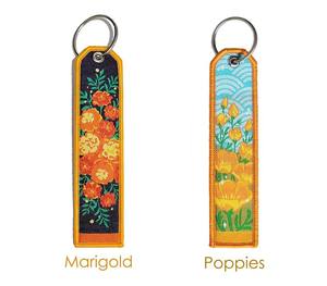 LLavero de parche tejido personalizado llavero de regalo promocional llaveros bordados al por mayor llavero de etiquetas florales tejido Jet personalizado - Product Image 6