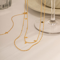 Collier à double couche plaqué or 18 carats en acier inoxydable avec pampilles et perles à sequins
