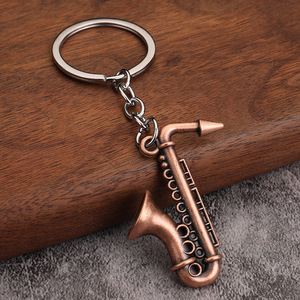 Khuyến mãi thời trang mini thiết kế trumpet Saxophone kim loại móc chìa khóa nhạc cụ Keychain quà lưu niệm sáng tạo Keychain Quà Tặng - Product Image 6