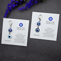 Meilleure vente transfrontalière : Porte-clés et pendentif de sac tendance en alliage de zinc, motif œil bleu porte-bonheur, fabriqué en Chine
