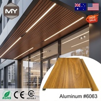 Plafond architectural en métal ignifuge en aluminium de qualité supérieure, finition noyer, pour revêtement mural extérieur de bâtiment, emboîtable 2026