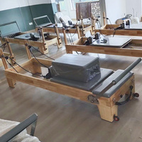 Machine classique commerciale de Pilates de réformateur de bois de chêne réglable pour le studio de yoga