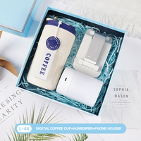 Coffret cadeau de voyage haut de gamme avec bouteille isotherme, éventail et parapluie pliant, idéal pour les fêtes d'anniversaire et les cadeaux de vacances