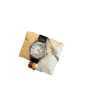 Refined Round Quartz Watches with <b>Floating</b> Crystal Accents Roman Numeral Dial and Sleek Leather Strap for Women Chopards - Product Image 1