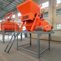 Malaxeur à béton à double arbre JS500 avec grue à câble et porte de déchargement manuelle pour la production de béton préfabriqué