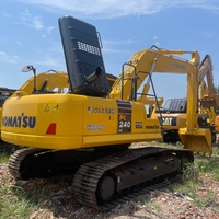Excavadora de cadenas usada KOMATSU PC240LC con línea de martillos auxiliares completa y bajo mantenimiento para tareas de rompe roca ligera y limpieza de terrenos