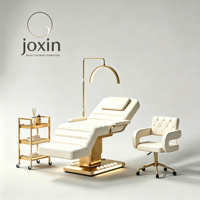 Table de massage et de soin des cils de luxe avec base dorée, idéale pour les cliniques de beauté et les spas – Vente en gros usine