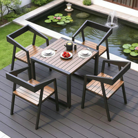 Ensemble de salle à manger moderne en métal et bois pour jardin, terrasse et balcon, idéal pour les cafés et les espaces extérieurs