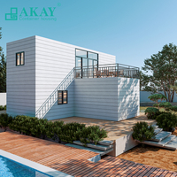 Maison préfabriquée modulaire extensible Akay Manufacturer, ignifuge et étanche, pour un camping rapide.