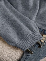Damen-Strickjacke im europäisch-amerikanischen Stil mit V-Ausschnitt, langen Ärmeln, offener Naht und süßer Schleifenverzierung