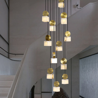 Lustre LED de luxe tout en cuivre, nouveau style chinois, villa duplex, escalier, espace ouvert, éclairage de salon, importé du Moyen-Orient