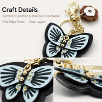 Élégant porte-clés en cuir avec fleur de camélia et papillon, pendentif de sac, ornement suspendu doré, cadeau pour femme, décoration