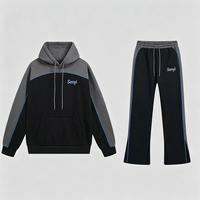 Ensemble streetwear unisexe coupe-vent respirant grande taille avec sweat à capuche color block et pantalon de survêtement évasé oversize 2 pièces
