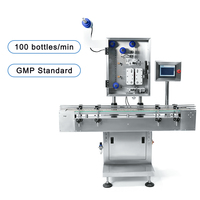 Insérateur automatique de canisters déshydratants de haute précision JF – Machine d'insertion de bouteilles déshydratantes pour applications chimiques