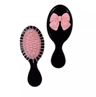 Peigne à coussin d'air mini en forme de nœud pour filles, portable, lissant, format voyage, pour l'exportation