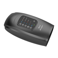 Machine de massage des mains du poignet d'acupression de thérapie électrique de chauffage vibrant la paume portable pour une relaxation confortable