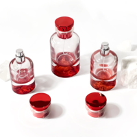Boîte de parfum ronde au design unique Pot cosmétique en verre Bouteilles de pulvérisation en verre Bouteille d'huile essentielle Bouteille de parfum de 100ml