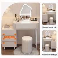 Bureau de toilette moderne crème avec poignées dissimulées, miroir LED nuage 3 couleurs et armoire latérale interchangeable.