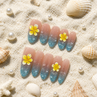 Ongles artificiels de luxe faits main en acrylique à couverture complète, motif nœud et pointe, dégradé bleu nude scintillant, forme ovale avec colle réutilisable