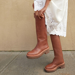 מגפי חום מותאם אישית יצרן נשים מעור הבוהן שטוח ירך מגפיים גבוהים מותאם אישית וינטג 'חום ארוך 2025 - Product Image 4