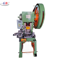 Machines automatiques à grande vitesse pour la fabrication d'œillets et de boutons avec presse à clips pour la production de boutons métalliques pour vêtements et chaussures