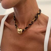 Collier ras-du-cou sexy léopard en alliage vintage avec étoile de mer, croix et cœur pour femme, idéal pour l'été et la plage, cadeau