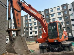 Excavatrice sur roues d'occasion Doosan DH150W-7, 15 tonnes, mobile, pour travaux de terrassement, avec moteur <span class=keywords><strong>mécanique</strong></span> <span class=keywords><strong>à</strong></span> économie de carburant, peinture d'origine - Product Image 2