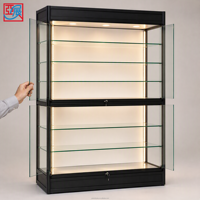 Mattschwarzer Rahmen LED-Glasvitrine Glasregale Abschließbare Vitrine Schiebetür aus Glas Einzelhandelsgeschäft Sammlerstücke