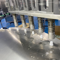 Machine de remplissage de liquide multifonctionnelle pour boissons à confiture Machine d'emballage automatique de bouchage de poche à bec verseur