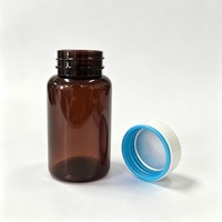 Flacon en PET transparent brun de 120 ml à large ouverture avec bouchon bleu pour compléments alimentaires, granulés à base de plantes, médicaments solides