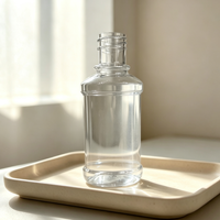 Bouteille diffuseur à roseaux en verre transparent avec bouchon à vis nervuré noir, logo LUMINARA doré en relief, conteneur de parfum vide de luxe