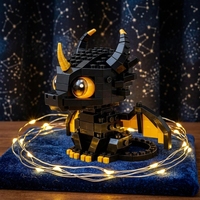Figurine de dragon noir mignon en blocs de construction, modèle de briques fantaisie Chibi avec yeux ambrés, ailes, cornes, jouet de collection DIY, cadeau