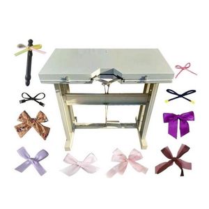 Machine manuelle pour la fabrication de nœuds papillon en ruban de satin, pour usage domestique, pour la création de nœuds papillon, la fabrication de nœuds, le pliage et la fixation des nœuds. - Product Image 1