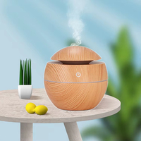 Diffuseur de vase à grain de bois blanc Mini humidificateur à brume fraîche à ultrasons Humidificateurs à grain de bois de forme ronde