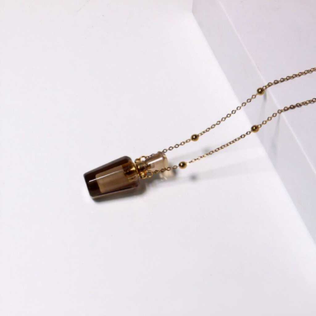Forme de bouteille en quartz fumé-or