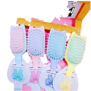 Peine de masaje con cojín de aire Xige, colorido, de plástico, de 10-15 cm, para el cuidado del cabello de bebés - Product Image 1