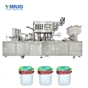 Machine de remplissage et de scellage automatique de tasses de thé de lait eau yaourt en plastique Machine de remplissage et de scellage automatique de tasses